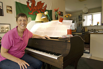 A photo of composer Gwyneth Walker in her studio