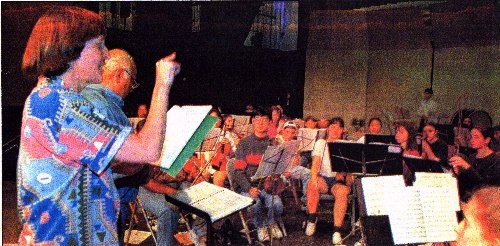 A photo of Gwyneth Walker, Robert Genualdi and the Greater Bridgeport Symphony Youth Orchestra